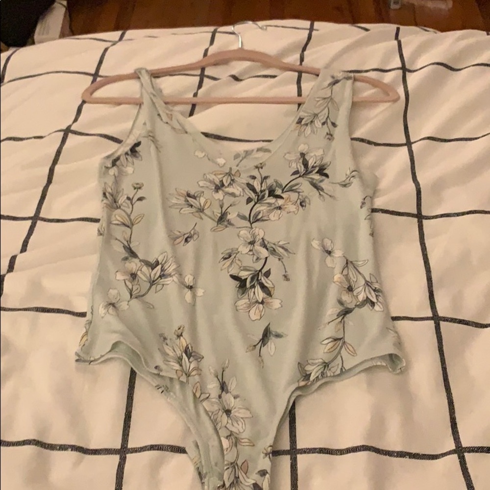 Body suit with floral design